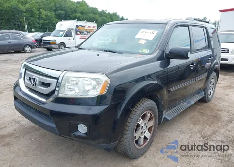 2010 Honda Pilot Touring z USA, uszkodzony, nr VIN 5FNYF4H98AB022133